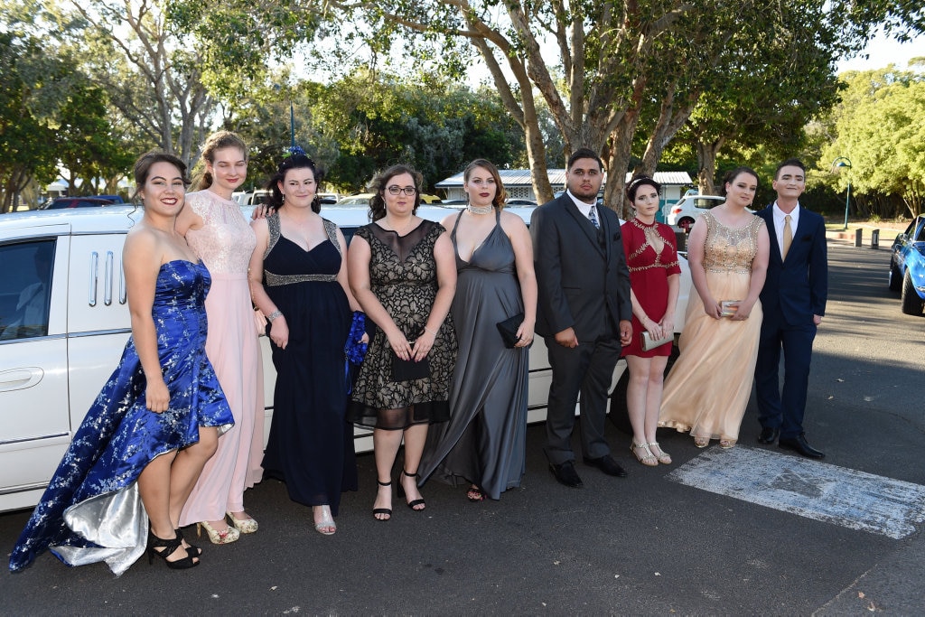 Hervey Bay High formal at the Waterfront - (L) Lauren Chan, Annalise Kimber, Hayley Warren, Emily Taylor, Kaylee Godfrey, Lachlan Richards, Brooke Fulton, Rachel Adams and Jace Heilig arrive in a stretch limo. Picture: Alistair Brightman