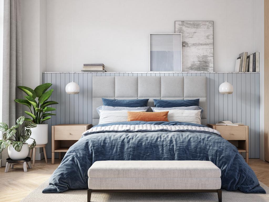 Buy your doona one size bigger than your bed to give your bed a sense of grandeur. Picture: iStock