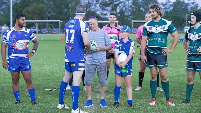 HONOURED: As a mark of respect, and support, Mr Brandon was pulled out onto the field and presented with a signed football during the first clash between his former clubs Beerwah and Maroochydore last week. Picture: Richard Goldsworthy