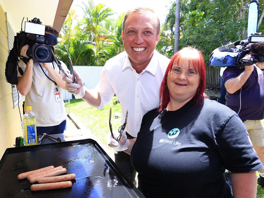 Premier Steven Miles with Emma Kimmorley on the barbecue at the Nerang Neighbourhood Centre. Picture: Adam Head.