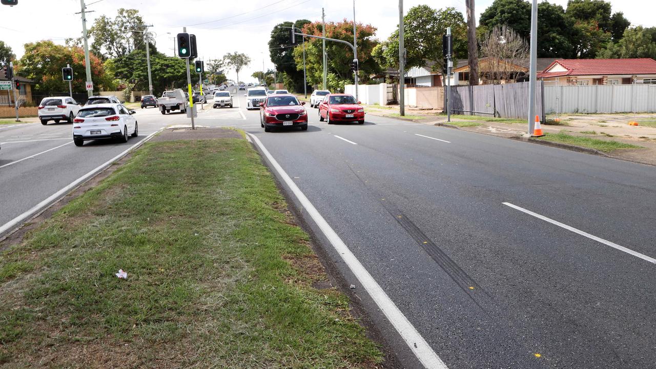 The scene on Mains Rd, Sunnybank, where a pedestrian was struck and killed by a car that allegedly ran a red light. Picture: Liam Kidston