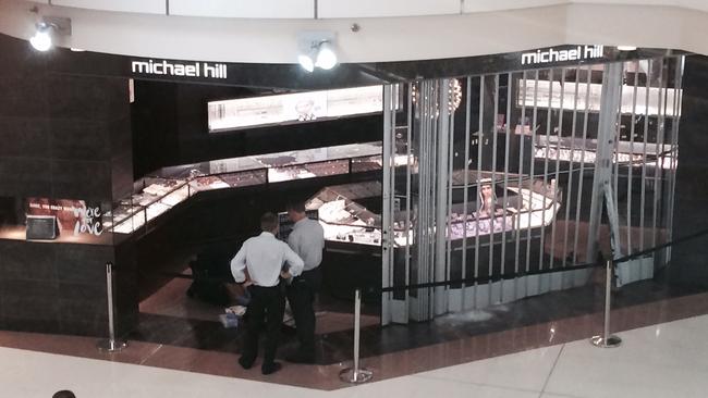 Police on scene at Michael Hill jewellers Australia Fair which was broken into. Photo: Jess Elder