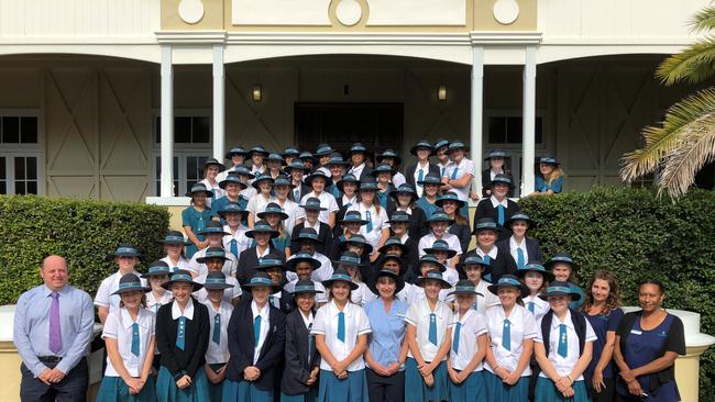 Mr Kevin Wallis, Ms Tracey Quinnell and YuMi Deadly maths students at St. Ursula's College in Yeppoon.