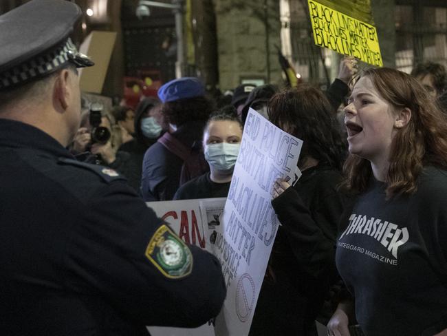 A young protester confronts police during a protest at Martin Place on Tuesday. Picture: Brook Mitchell/Getty Images