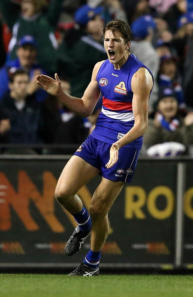 Marcus Bontempelli celebrates kicking the winning goal in Western Bulldogs’ win over Melbourne. Picture: Wayne Ludbey