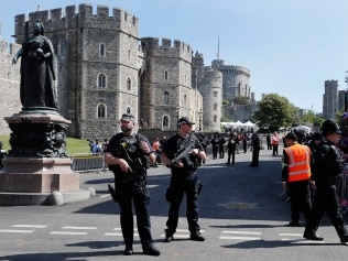 WINDSOR, UNITED KINGDOM - MAY 19:  Armed police secure the route of the carriage procession prior to the wedding ceremony of Prince Harry and Meghan Markle at St. George's Chapel in Windsor Castle on May 19, 2018 in Windsor, England. (Photo by Frank Augstein - WPA Pool/Getty Images)