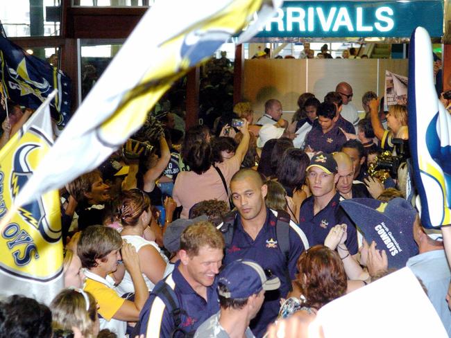 Cowboys players are welcomed home after their upset win over the Bulldogs.