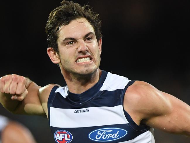 Daniel Menzel of the Cats reacts after kicking a goal during the Round 5 AFL match between the Port Adelaide Power and the Geelong Cats at the Adelaide Oval in Adelaide, Saturday, April 21, 2018. (AAP Image/Julian Smith) NO ARCHIVING, EDITORIAL USE ONLY