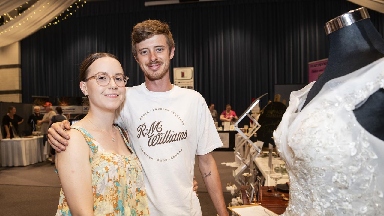 Engaged couple Jaylee Murphy and Troy Bourne with a dress by A touch of Romance at Toowoomba's Wedding Expo hosted by Highfields Cultural Centre, Sunday, January 21, 2024. Picture: Kevin Farmer