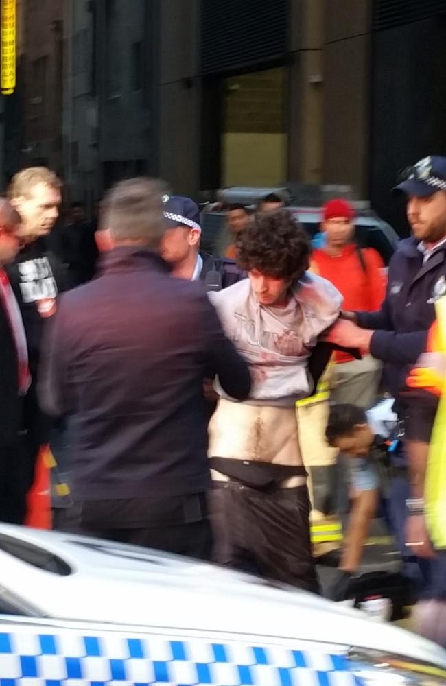 A man is seen being arrested on Clarence Street in Sydney. Picture: Supplied