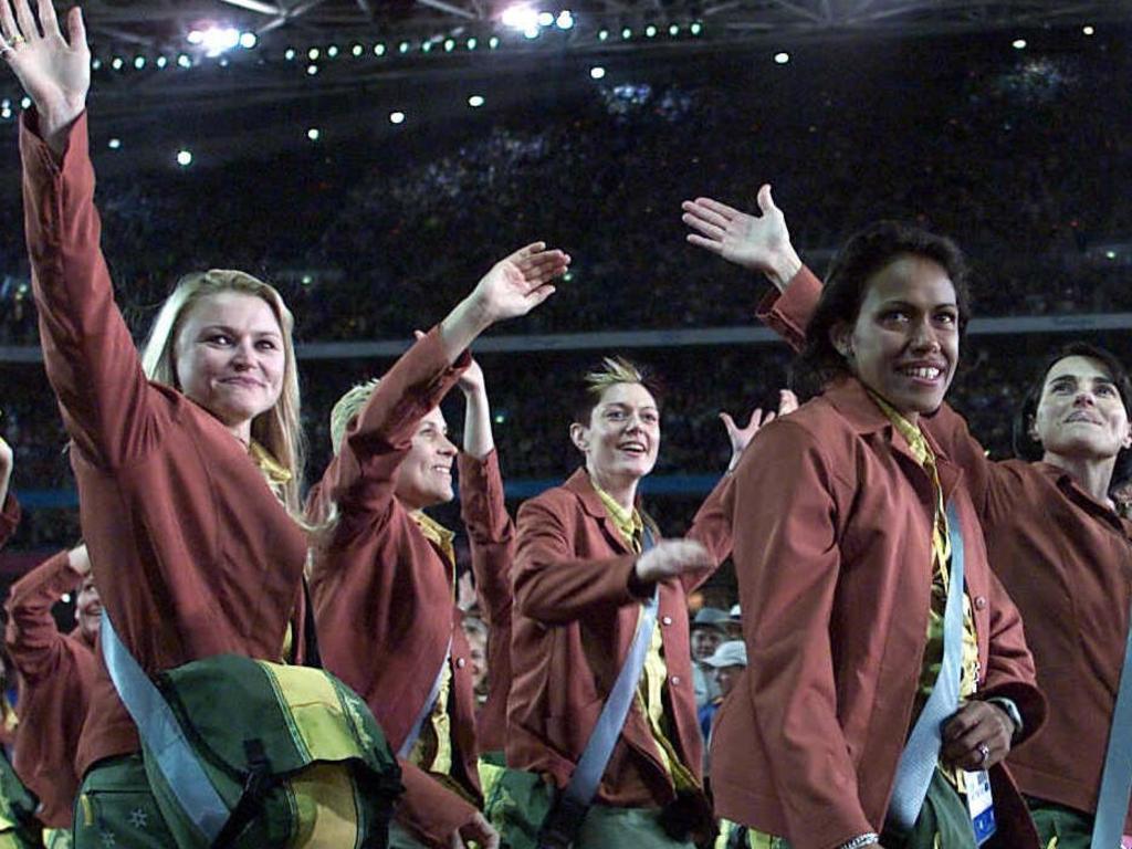 Melinda Gainsford-Taylor and Cathy Freeman march with the Australian team during the opening ceremony.