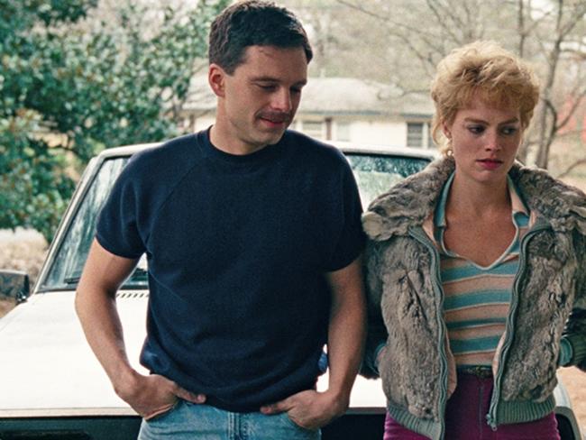 Robbie (as Tonya Harding) alongside co-star Sebastian Stan.