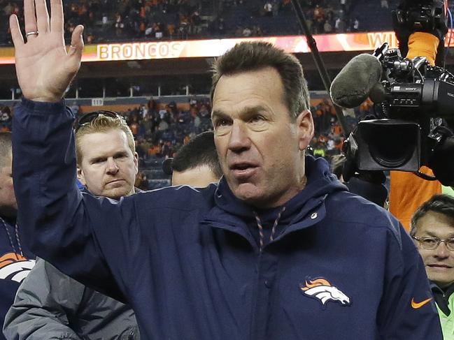 Denver Broncos coach Gary Kubiak waves as he walks off the field after the team's NFL football game against the Oakland Raiders, Sunday, Jan. 1, 2017, in Denver. The Broncos won 24-6. (AP Photo/Jack Dempsey)