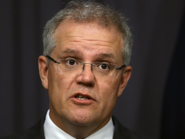 Job ID PD390206. Minister for Immigration and Border Protection, Scott Morrison during a media conference at Parliament House in Canberra. He spoke in reference to the Migration and Maritime Powers Legislation Amendment (Resolving the Asylum Legacy Caseload) Bill 2014. Pic by Gary Ramage