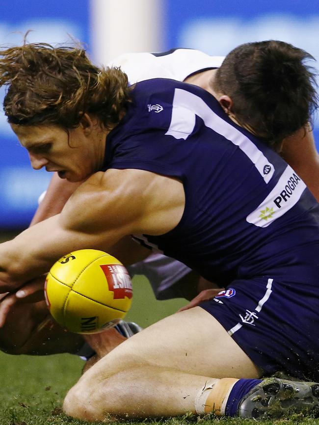 Fyfe was in trouble again for a high bump on Kangaroo Ben Jacobs. Picture: Michael Klein.