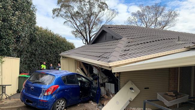 A car had crashed into a house on McEwan Circuit, Mount Annan. Picture: NSW Ambulance