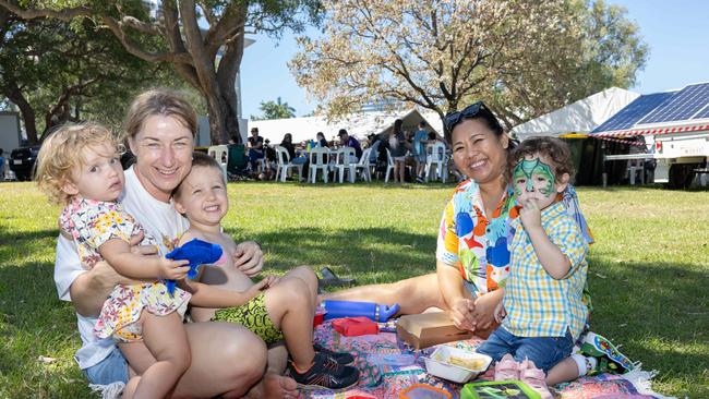 For many families, the picnic rug was the preferred dining area. Picture: Pema Tamang Pakhrin