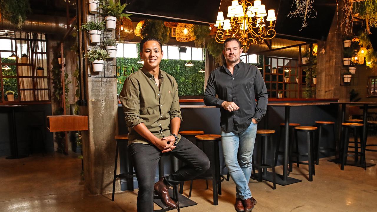 Co-owners Justin Kong and Patrick Donohue inside their new venue Newstead Social. Picture: Zak Simmonds