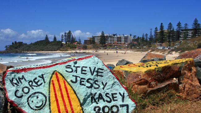 Port Macquarie breakwall and rocks overlooking Town Beach over the years has seen people leave messages and designs on the rocks.