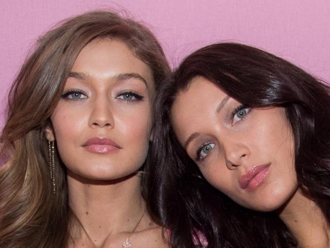 PARIS, FRANCE - NOVEMBER 30:  L-R) Gigi Hadid and Bella Hadid pose backstage prior to the Victoria's Secret Fashion Show on November 30, 2016 in Paris, France. (Photo by Pascal Le Segretain/Getty Images for Victoria's Secret)