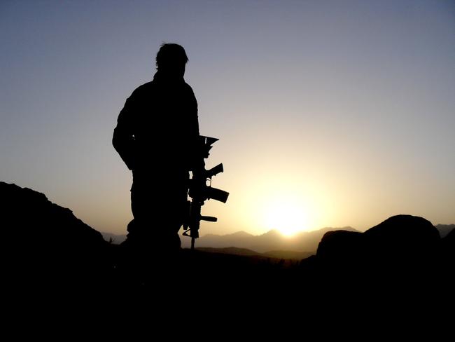 Caption: An Australian Special Operations Task Group soldier observing the valley during the Shah Wali Kot Offensive. Mid Caption: Shah Wali Kot Offensive Afghan National Security Forces (ANSF) partnered with Australian Special Forces from the Special Operations Task Group conducted a deliberate operation to clear a Taliban insurgent stronghold in the Shah Wali Kot region of northern Kandahar province. The Shah Wali Kot Offensive comprised synchronised and deliberate clearance operations involving Australian Commandos combined with a number of surgical helicopter-born assaults from Special Air Service (SAS) troops on key targets. Removing Taliban insurgents from Afghan communities allows the Government of Afghanistan to establish a presence and gain the trust of the community to provide them with necessary infrastructure and security that was not provided by the insurgents.