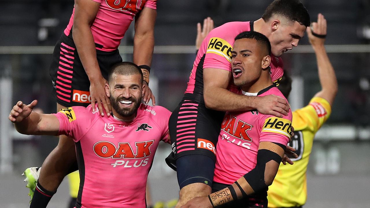 Penrith players celebrate Stephen Crichton’s try against the Wests Tigers.