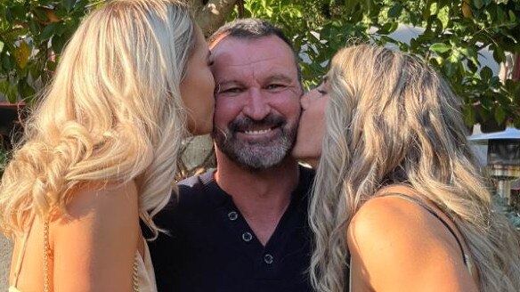 Micaela Diedrichs and Emma Diedrichs with their dad Shane Diedrichs. Picture: supplied