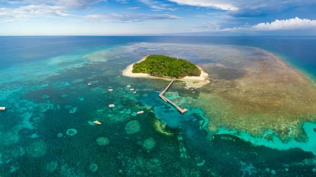 Green Island, Queensland. The resort will temporarily close until border restrictions are lifted. Day trips remain unaffected by the changes.