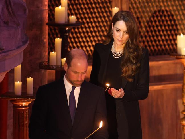 The Wales’ lit candles during the ceremony. Picture: Dan Kitwood/Getty Images