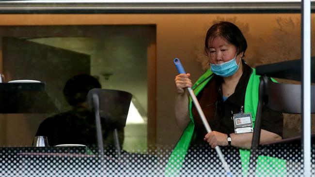 The casino being cleaned after it was exposed to COVID-19, although NSW Health has failed to use CCTV to find the person. Picture: Toby Zerna