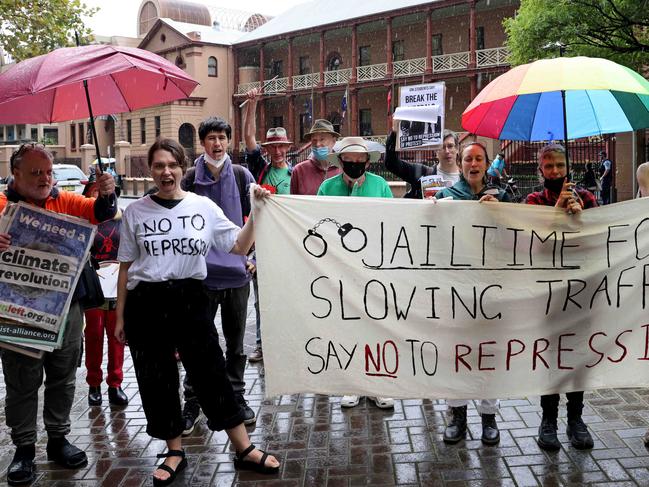 SYDNEY, AUSTRALIA - NewsWire Photos MARCH 30, 2022: Protesters pictured outside state Parliament in the Sydney CBD at the Snap Action against anti-protest laws and state repression rally.Picture: NCA NewsWire / Damian Shaw