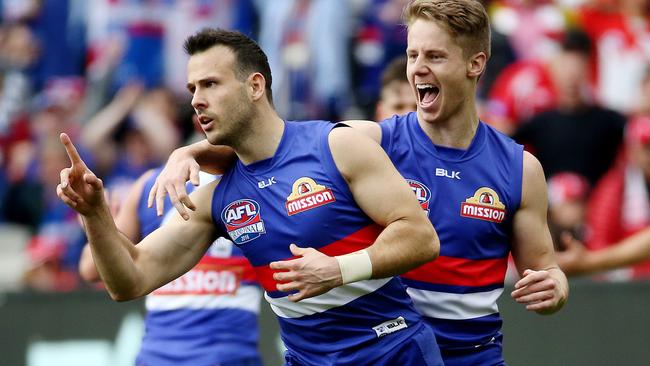 Lance Franklin was a concern for the Swans but the Dogs didn’t care. When Tory Dickson swooped on a loose ball his side was out to a two-goal lead. Liam Picken added another shortly after. Picture: Colleen Petch.