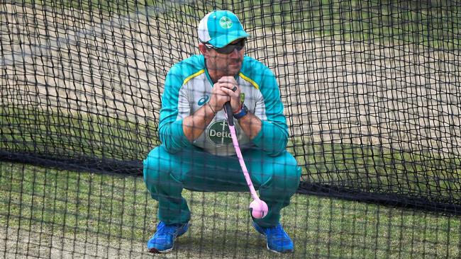 Australia’s coach Justin Langer watches his batsmen in the nets during a training session at the MCG in Melbourne on Sunday. Picture: AFP