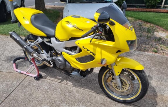 Jayden Burkett was intercepted by police driving a stolen unregistered 2001 yellow Honda motorcycle, similar to the one pictured, in August last year. Picture: bikesales