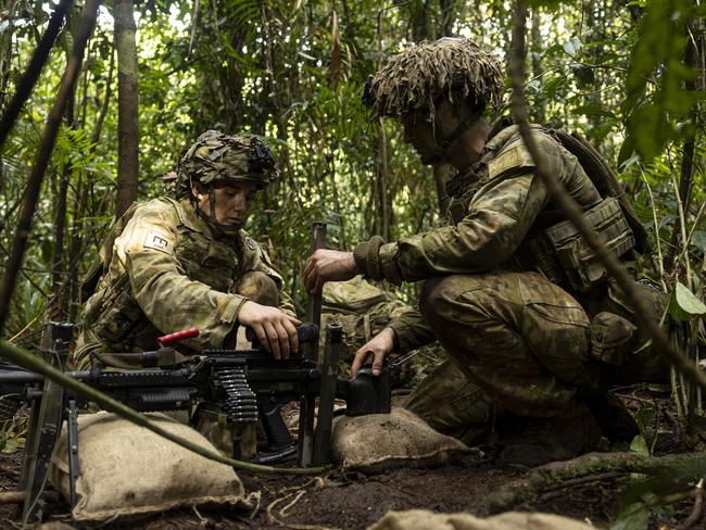 Australian Army sappers from 3rd Combat Engineer Regiment stake in the gun during the annual 3rd Brigade Military Skills competition at Tully Training Area, Queensland. PHOTO: LCPL Riley Blennerhassett