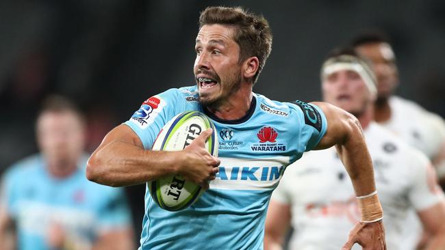 Jake Gordon on his way to scoring a try for the Waratahs. Picture: Getty Images 