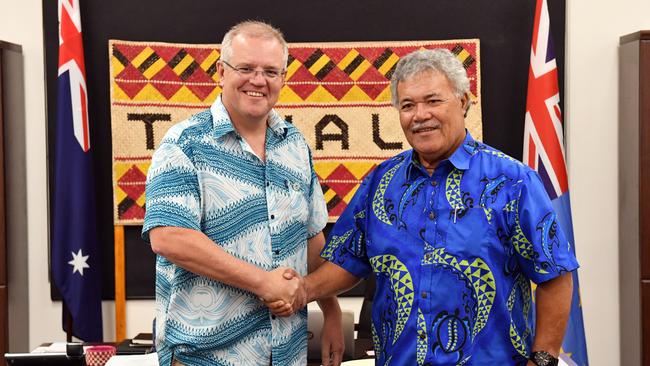 Former Tuvalu prime minister Enele Sopoaga pictured with former Australian prime minister Scott Morrison at the last Pacific Islands Forum in Tuvulu in 2019. Picture: AAP Image/Mick Tsikas