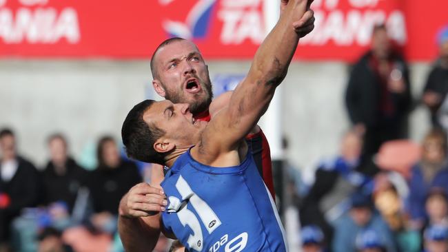 Gawn faces North Melbourne's Braydon Preuss early in the pre-season. Picture: LUKE BOWDEN