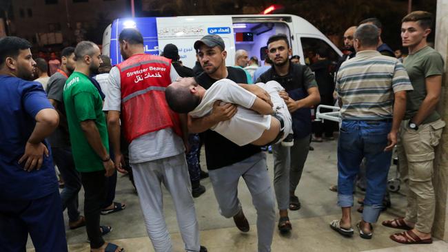 Palestinians injured in Israeli air raids arrive at Nasser Medical Hospital on November 2, 2023 in Khan Yunis, Gaza. Picture: Ahmad Hasaballah/Getty Images