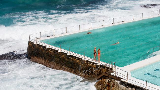 People take in the view at Bondi on Wednesday. Millions of Australians have been issued warnings as severe thunderstorms threaten to drench the southeast with the wettest December in 14 years. Picture: NewsWire / Nikki Short