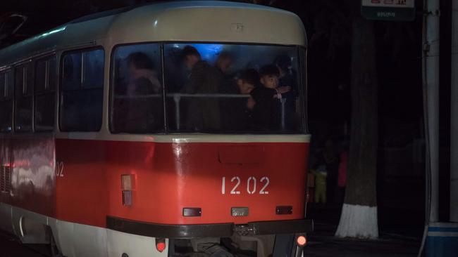 Commuters ride a tram in Pyongyang. Picture: AFP / Ed Jones.