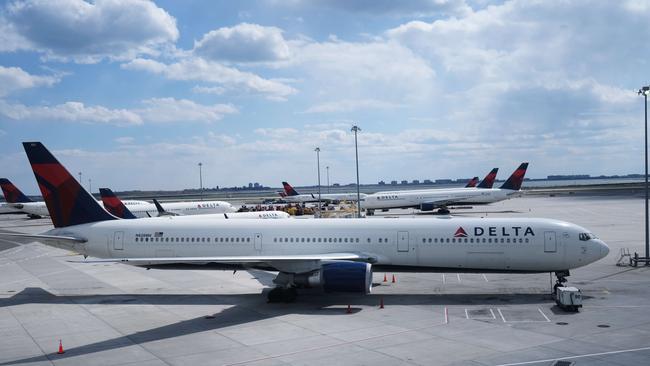 Delta planes sit on the tarmac at an empty John F. Kennedy Airport in New York. Picture: AFP.