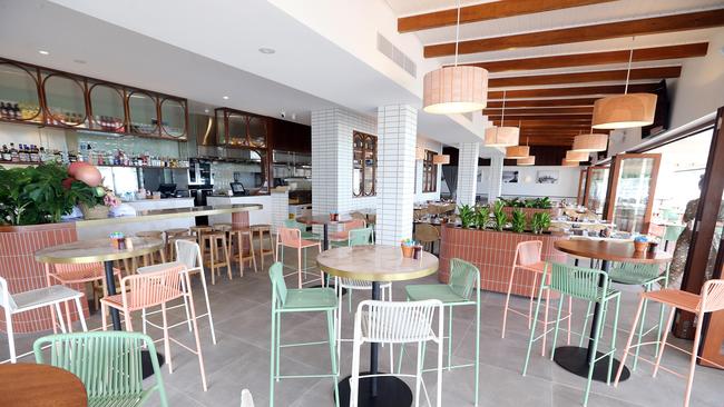 New restaurant 'Siblings Kirra' has opened up at the former site of Pizza Hut on the esplanade. Owners TJ Cianci and Jarrod Kyle inside the venue with some dishes from the menu. 14 January 2022 Coolangatta Picture by Richard Gosling