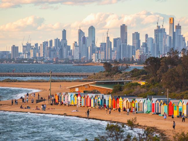 Brighton bathing boxes and Melbourne skyline.Escape 27 August 2023Twin Share - Neil WhitakerPhoto - Getty Images