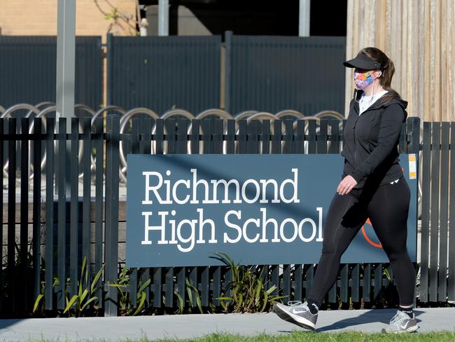 MELBOURNE, AUSTRALIA - NewsWire Photos SEPTEMBER 7, 2020: A person walks past an empty Richmond High School. Picture: NCA NewsWire / Andrew Henshaw
