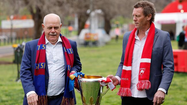 Former Brisbane coach Leigh Matthews (left) and Sydney captain Stuart Maxfield will present the premiership cup to their side if successful in the grand final. Picture: Dylan Burns / Getty Images