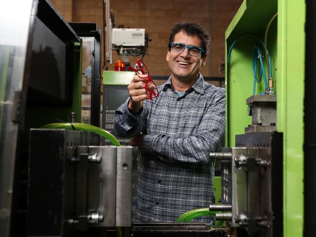 Dresden Vision founder Bruce Jeffreys with his glasses made in a factory in Campbelltown. Picture: Jonathan Ng