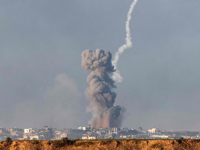 Smoke billowing after an Israeli shell reportedly hit a rocket launcher. Picture: AFP