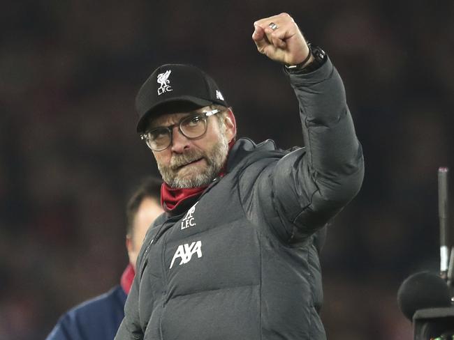 Liverpool's manager Jurgen Klopp celebrates at the end of the English Premier League soccer match between Liverpool and Manchester City at Anfield stadium in Liverpool, England, Sunday, Nov. 10, 2019. Liverpool won 3-1. (AP Photo/Jon Super)