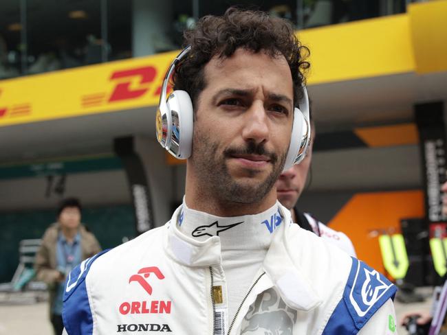 RB's Australian driver Daniel Ricciardo looks on before the sprint race ahead of the Formula One Chinese Grand Prix at the Shanghai International Circuit in Shanghai on April 20, 2024. (Photo by Andres Martinez Casares / POOL / AFP)